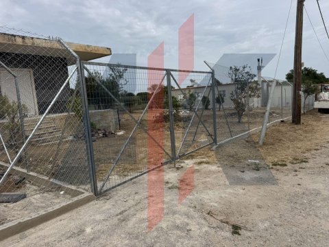 Περίφραξη οικοπέδου με σύστημα αποτροπής εξόδου φυλασσόμενων ζώων
